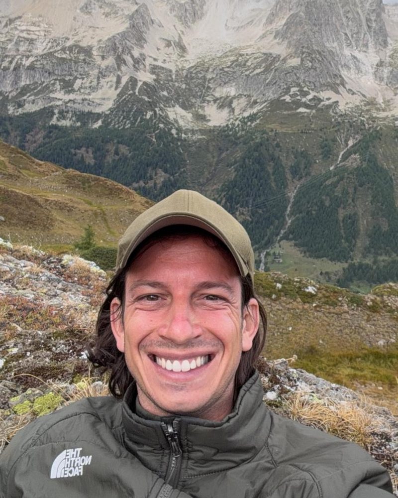 Alessandro Soldati smiling in the Swiss mountains